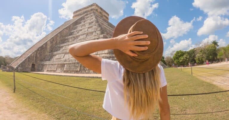 woman at chichen itza pyramid on one of the best Private Tulum tours