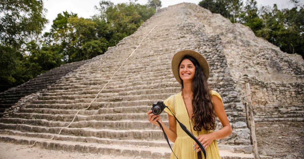 woman at coba ruins yucatan mexico