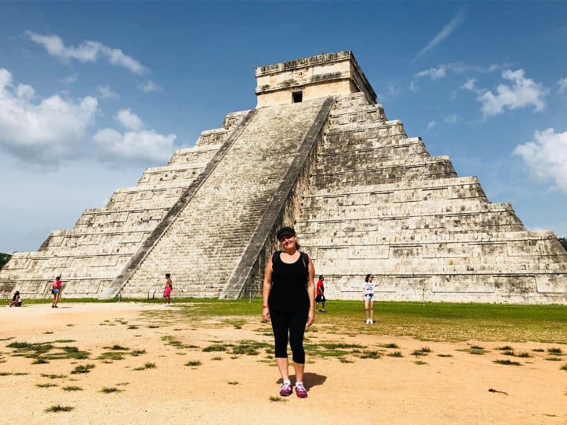 woman at chichen itza ruins on one of the best TOURS