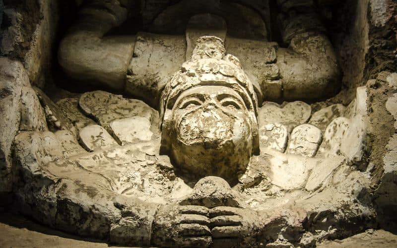mayan god carving