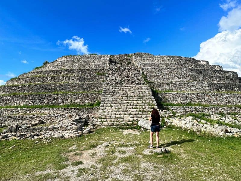 woman about to climb Kinich Kakmó Pyramid at Izamal Ruins Yucatan Mexico